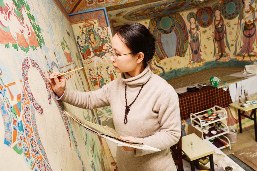 Chinese couple restore Mogao Grottoes