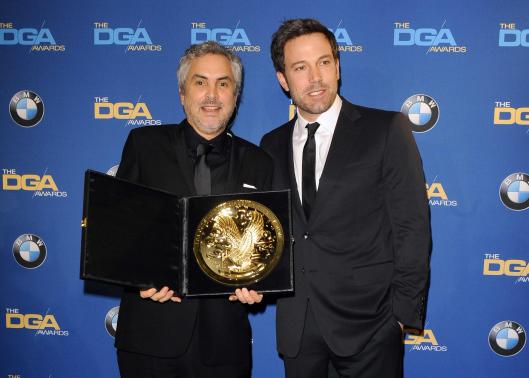Cuaron wins directors award as 'Gravity' gathers speed to Oscars
