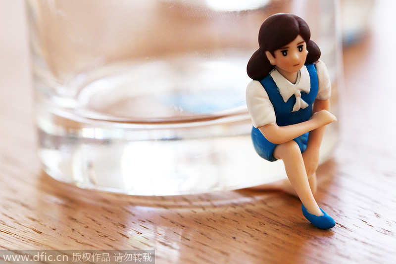 Cute mini figures on the edge of cups from Japan