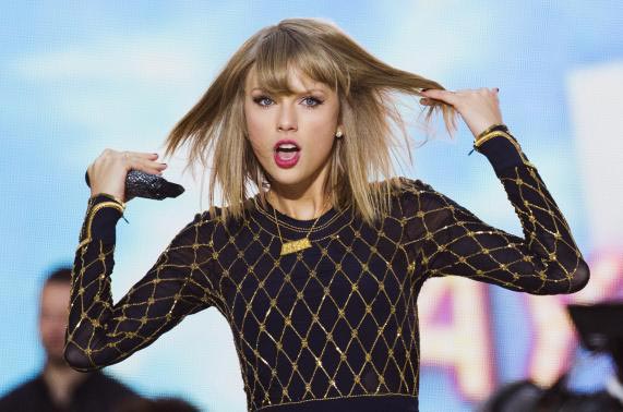 Taylor Swift shakes off competition to hold Billboard top spot