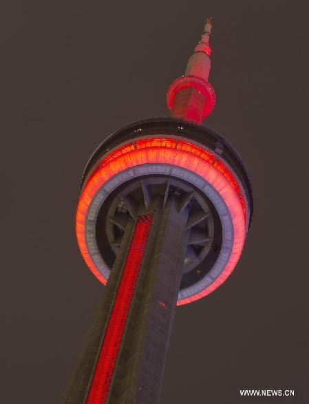 Toronto's CN Tower lights up to celebrate Chinese lunar New Year