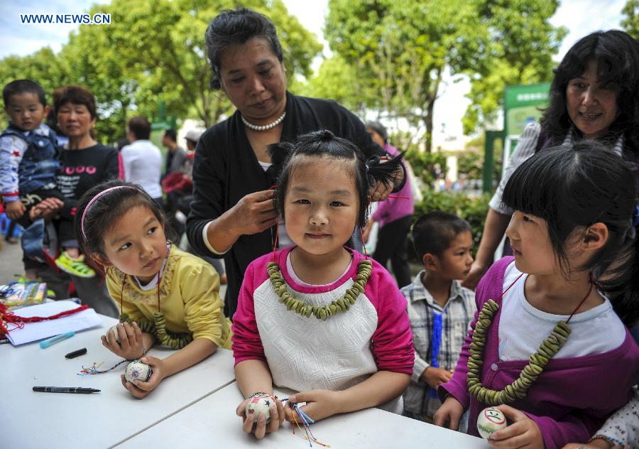 Children participate in activities marking day of Li Xia around China