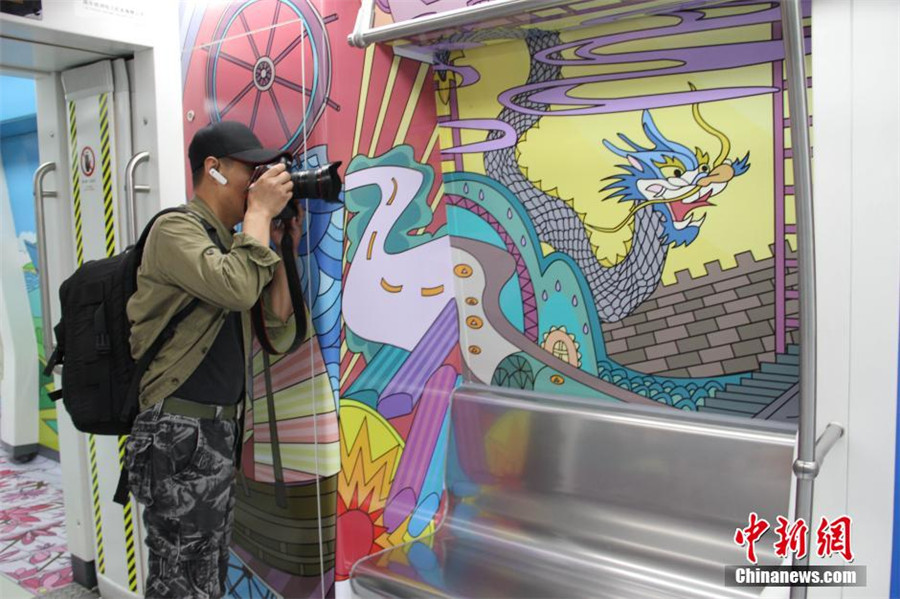 Train filled with cartoon art inspired by Maritime Silk Road