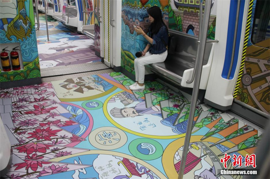 Train filled with cartoon art inspired by Maritime Silk Road