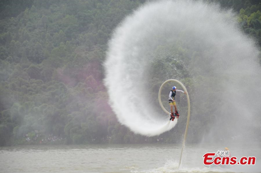 Waterskiing stunt performance at cultural festival