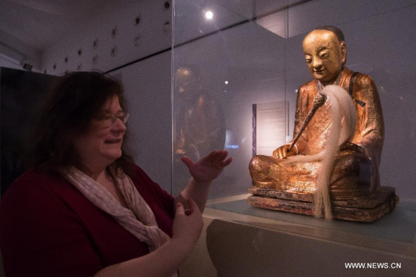 Village awaits return of Buddha statue with monk inside