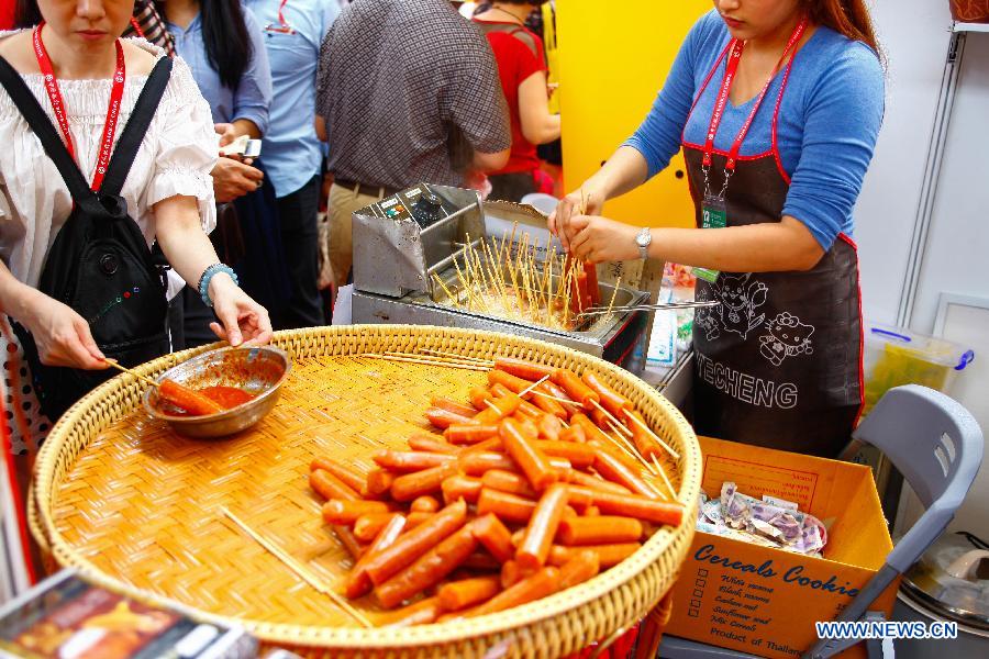 A bite of yummy food at 12th China-ASEAN Expo