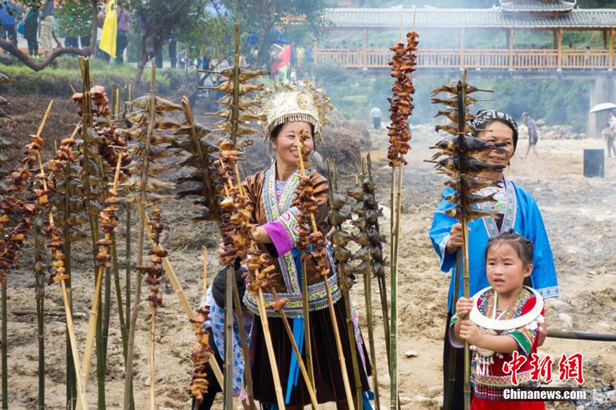 Miao people celebrate traditional 'grilling fish' festival
