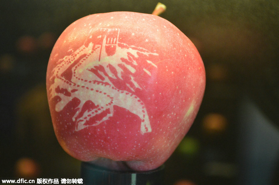 French 'apple art' wows Shanghai
