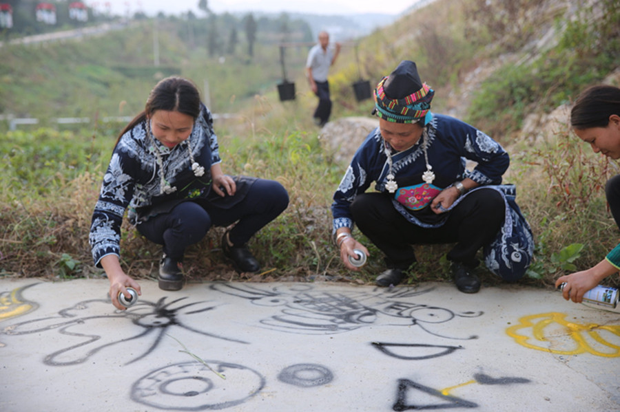 Miao people celebrate as old art meets new medium