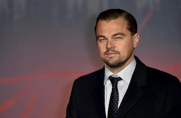 DiCaprio, Inarritu welcomed by screaming fans in Rome