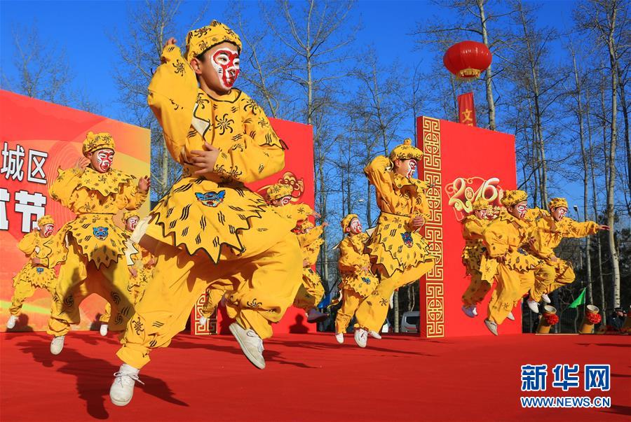 Children dress up to greet the Year of the Monkey