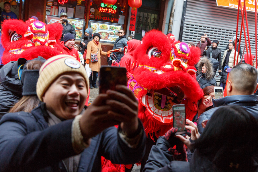 People celebrate Chinese Lunar New Year at Manhattan's Chinatown in New York