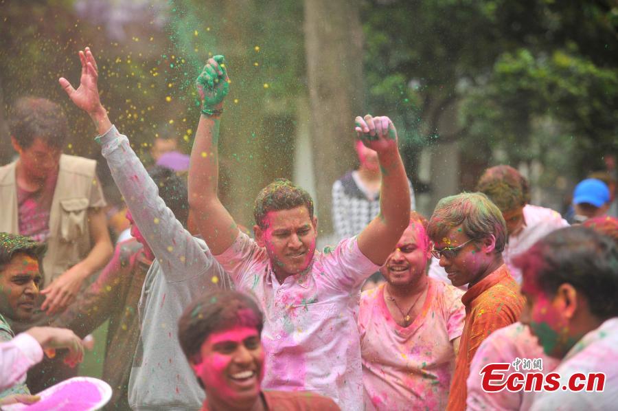 Chinese and Indians celebrate Holi
