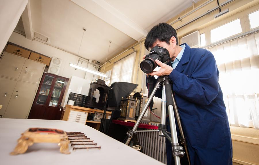 Clock repairman at Palace Museum keeps history in time