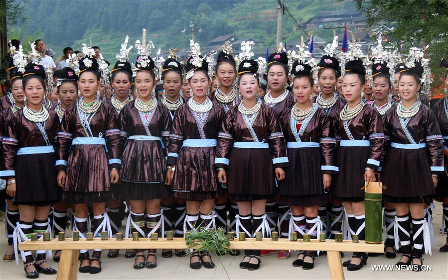 People of Dong ethnic group perform to promote local tourism