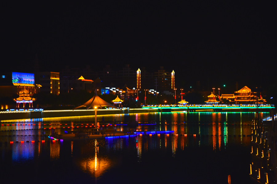 Vibrant night cityscape of Gansu's Dunhuang city