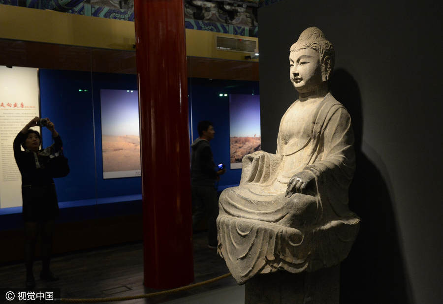 Chinese and Indian sculptures on display at the Palace Museum in Beijing