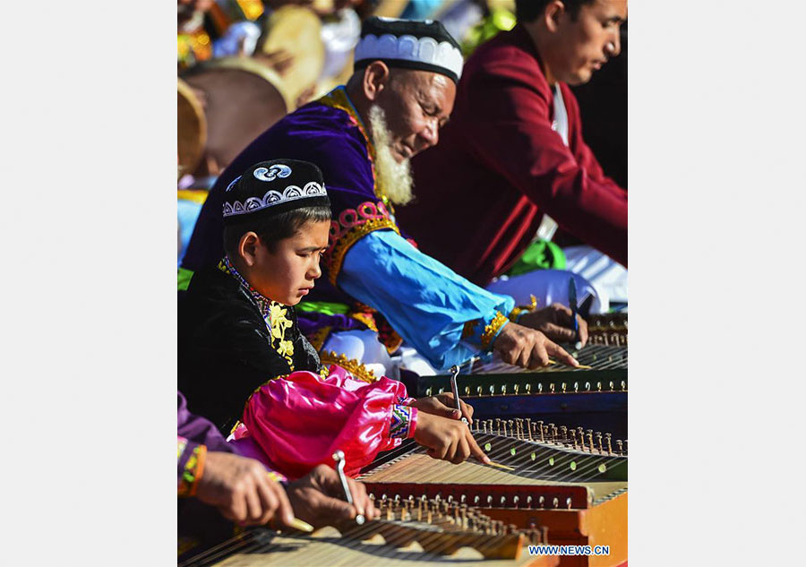 Uygur ethnic artists perform Daolang Mukam in NW China's Xinjiang