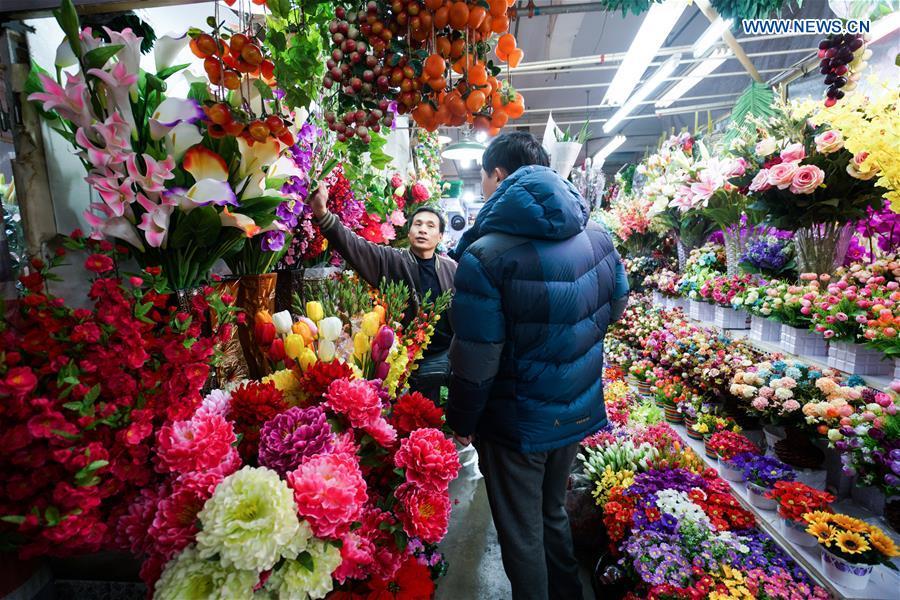 Customers shop at flower market in Beijing