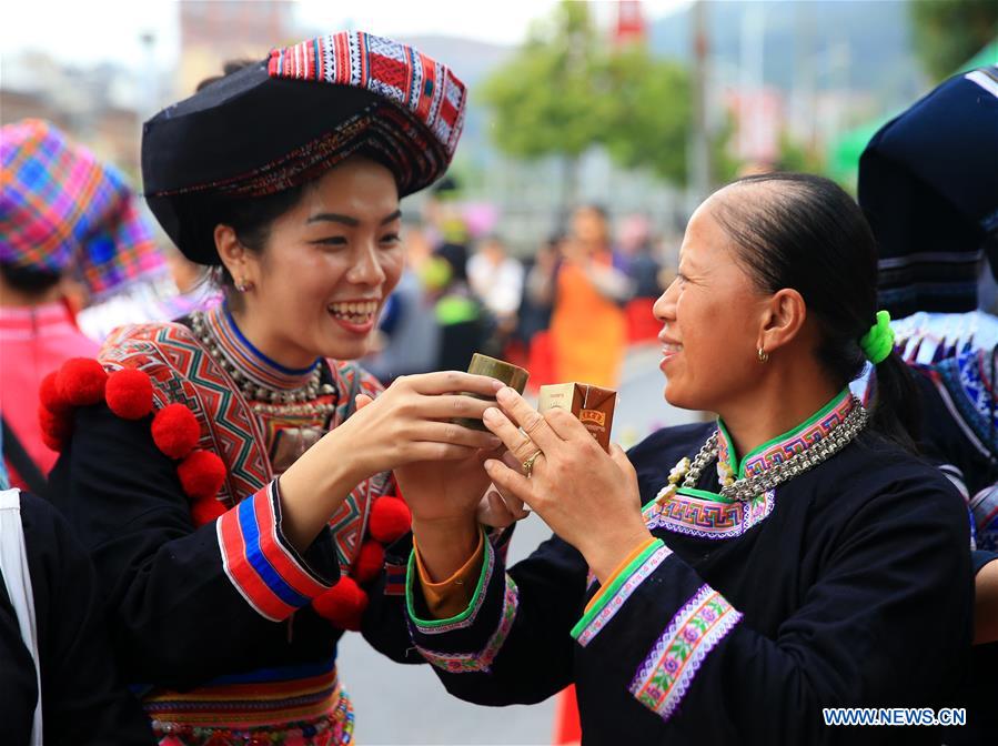 People of Zhuang ethnic group attend 'hundred-family banquet' in S China