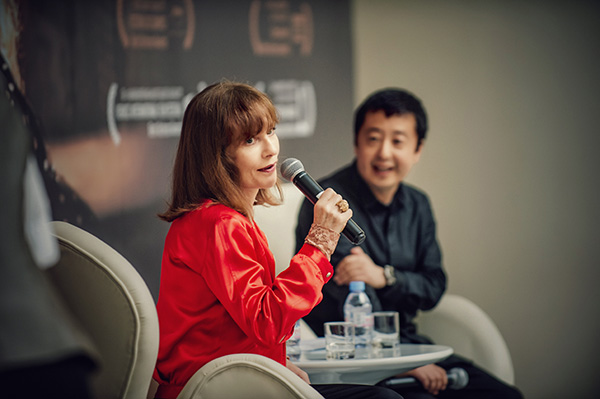 French star Huppert meets Chinese filmmaker