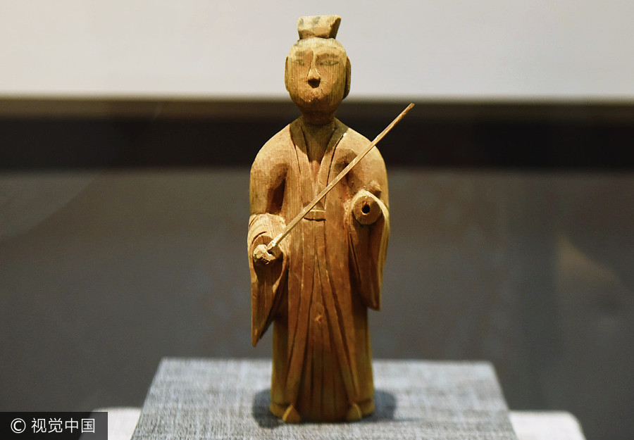 Cute carved artifacts on display in E China