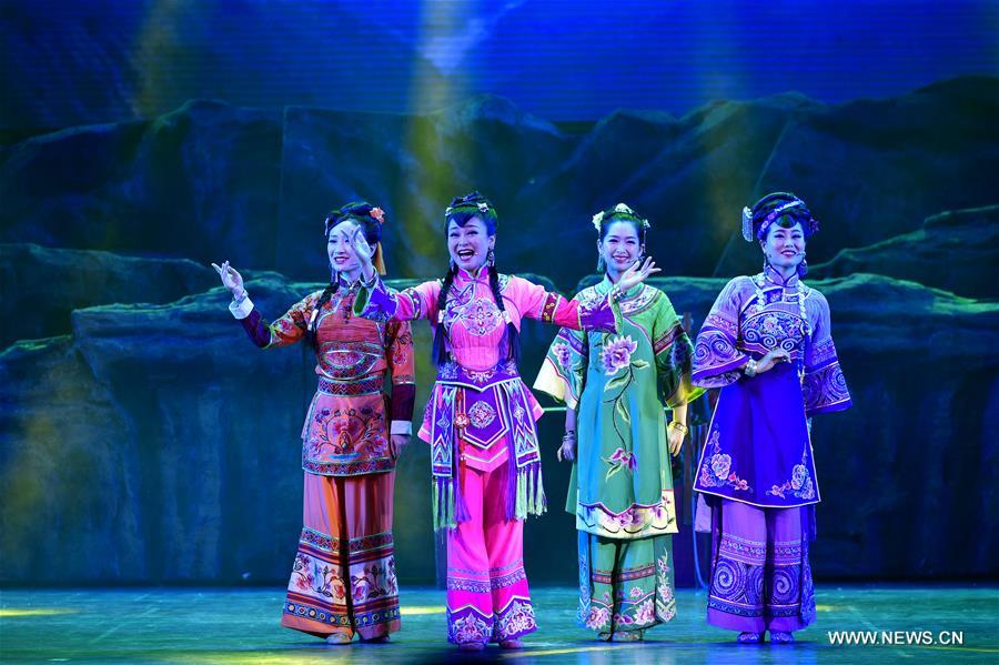 Actors perform folk musical drama in C China's Hubei