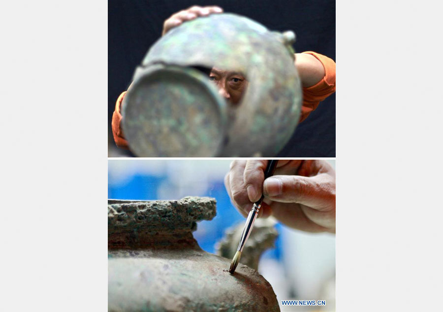 Technicians restore original forms of historical relics in Anhui Museum
