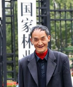 华南虎事件被免局长仍领工资 周正龙盖洋楼