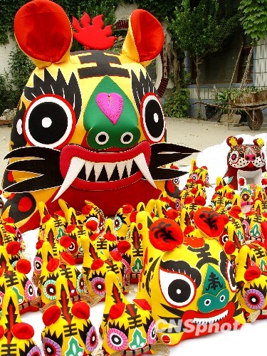 中国“虎文化”：从“神的化身”到“消灾符号”
