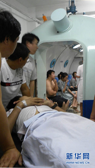 沈阳万达广场发生火灾致9死9伤 墙体爆裂(图)