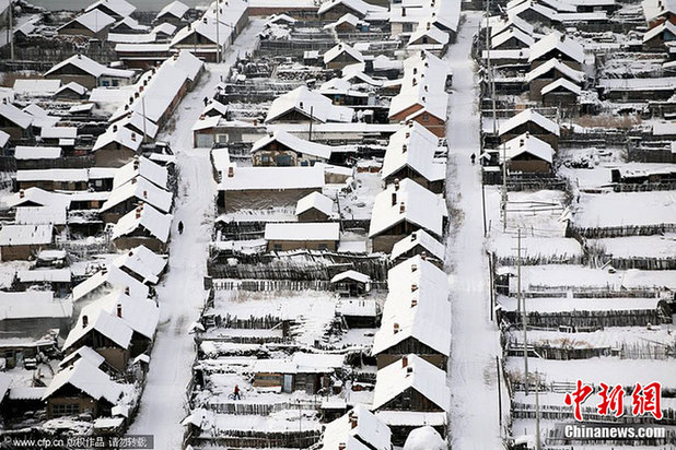 中国大部分地区普遍降温 迎来降雪天气