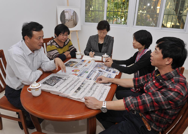 海口市委常委、宣传部长吴川祝走访中国日报海南记者站