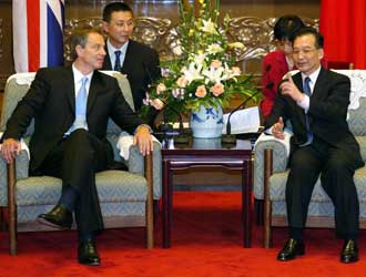 Blair: 'One country, two systems' in HK gratifying