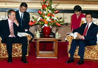 Blair: 'One country, two systems' in HK gratifying