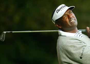 Fiji's Vijay Singh watches his tee shot on the second hole at the World Match Play Championship at Wentworth in southern England, October 14, 2004. [Reuters/file]