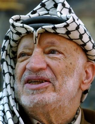 Palestinian leader Yasser Arafat is shown during a meeting at his headquarters in the West Bank town of Ramallah on Sept. 26, 2004. [AP/file]