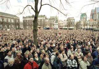 Ten thousands protesters demonstrate outside Dutch government buildings as the Upper House of Parliament debates the legalization of euthanasia at The Hague, Netherlands, in an April 10, 2001 file photo. Groningen Academic Hospital in the Netherlands _ the first nation to permit euthanasia _ recently proposed guidelines for mercy killings of terminally ill newborns, and then made a startling revelation: It has already begun carrying out such procedures, which include administering a lethal dose of sedatives. [AP]
