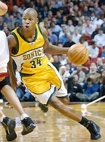Milwaukee Bucks' Ray Allen tries to drive past Miami Heat's Eddie Jones in  the fourth quarter Tuesday, Nov. 19, 2002, in Milwaukee. Allen was the  games leading scorer with 24 and Jones