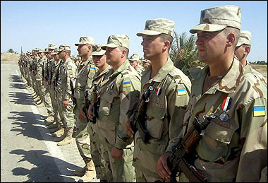 Ukrainian troops at their base in the Iraqi city of Kut, October 2004. The winner of Ukraine's presidential vote Viktor Yushchenko said that withdrawing the nation's troops from Iraq will be a priority for him once he takes office, after an accidental blast killed seven Ukrainian soldiers there. [AFP/File]