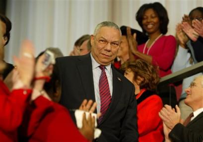 US State Department employees clap for Secretary of State Colin Powell before his farewell speech at the State Department on Wednesday, Jan. 19, 2005 in Washington. [AP]