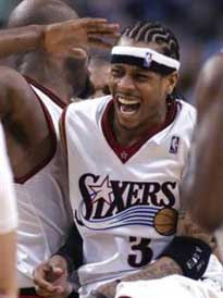 Allen Iverson of the Philadelphia 76ers celebrates after making a