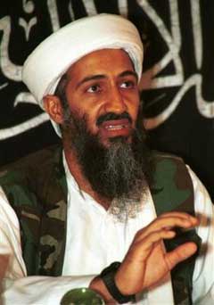 Osama bin Laden speaks to the journalists in this 1998 photo taken in Khost, Afghanistan and made available Friday March 19, 2004. [AP] 