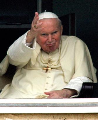 Pope John Paul (news - web sites) II waves to faithful as he appears at the end of the traditional Angelus prayer at a window of his apartment on the 10th floor of Rome's Gemelli Polyclinic Hospital, Sunday, March 6, 2005, where he is hospitalized after undergoing surgery to ease his breathing. (AP Photo/Lionel Cironneau) 