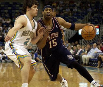 Jacque Vaughn of the New Jersey Nets dribbles against the Orlando
