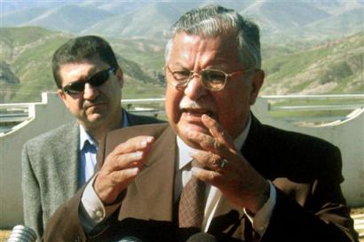 Kurdish leader Jalal Talabani, likely soon to be named Iraqi president, speaks at a press conference in Chwalan, near Sulaimaniyah in northern Iraq Monday, March 14, 2005. Kurdish leaders were converging in Baghdad for last-minute talks Monday with majority Shiites as both sides pressed to secure a deal to form a coalition government before the newly-elected parliament meets for the first time later this week. [AP]