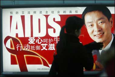 An AIDS billboard in Beijing. China plans to set up a national database containing the records of its HIV/AIDS victims in a bid to get a better grip of the extent of the epidemic. [AFP/file]