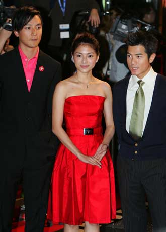 American-Chinese actor Daniel Wu, Malaysian actress Angelica Lee and Hong Kong actor and singer Aaron Kwok attend the opening ceremony of "Entertainment Expo" in Hong Kong March 21, 2005. 