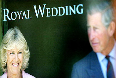 A poster celebrating the upcoming Royal Wedding hangs in the window of the local tourist office near Windsor Castle and the Guildhall. Camilla Parker Bowles will be given the title Princess of Wales, the one most associated with the late Princess Diana, when she marries Britain's Prince Charles on Friday, a newspaper said.(AFP/File/Adrian Dennis) 